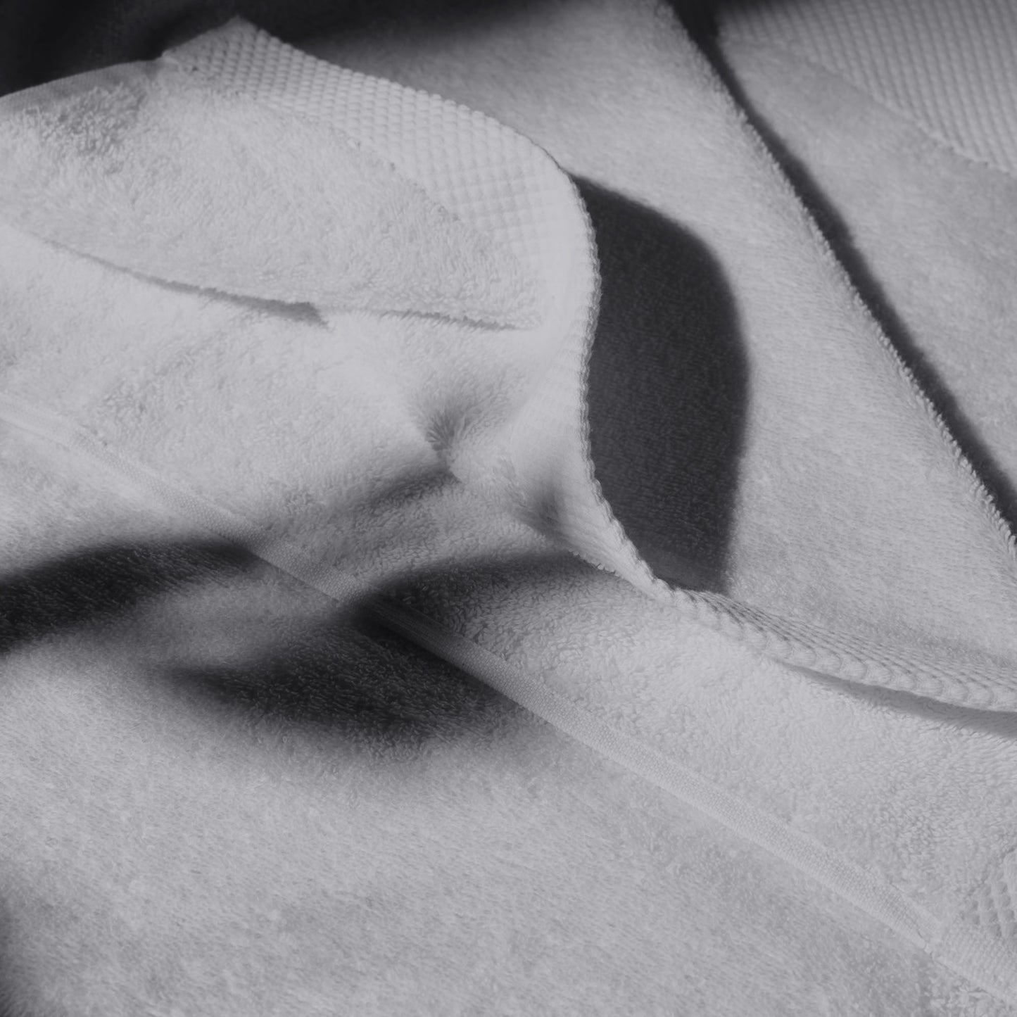 Of Super Soft Towels Oasis (bundle Of 3) - Grey on bed by Voucler
