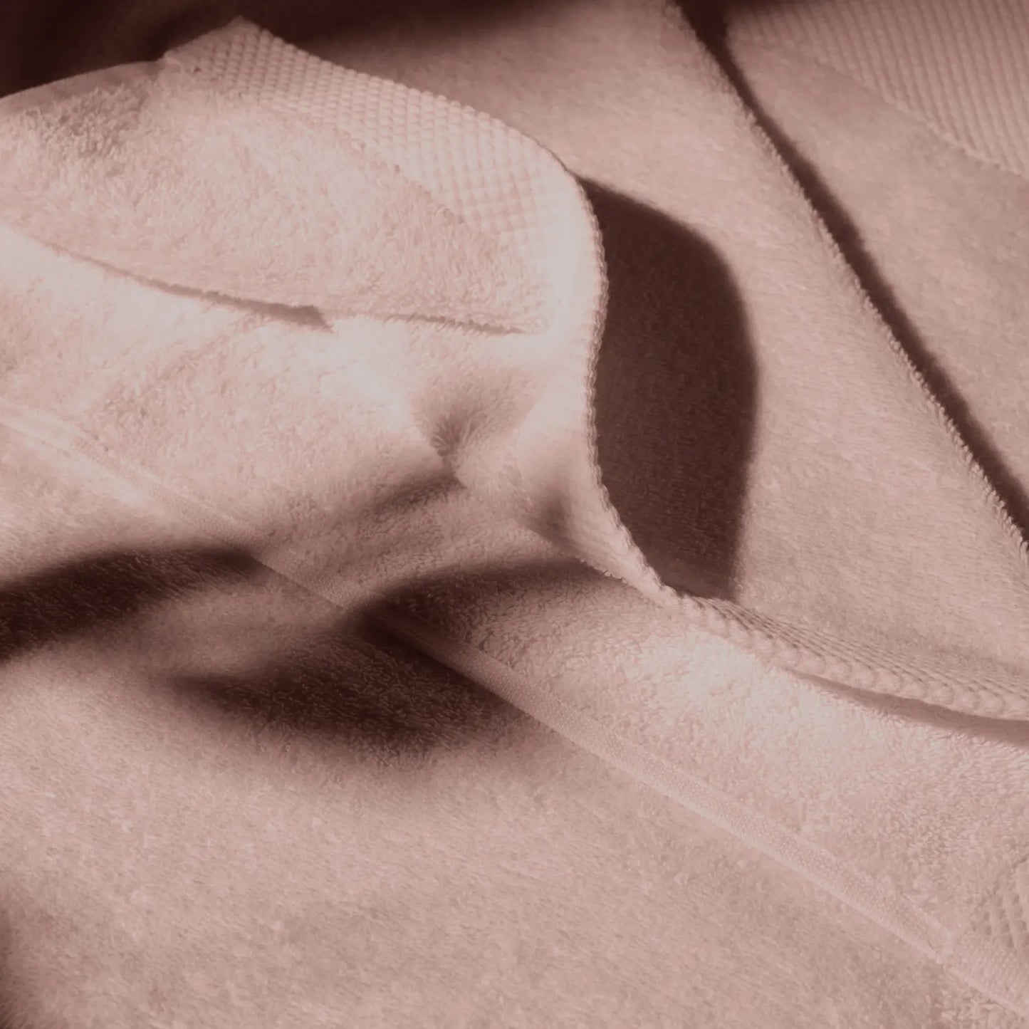 Detailed image of a rose towel, conveying a feeling of cleanliness and hygiene care.