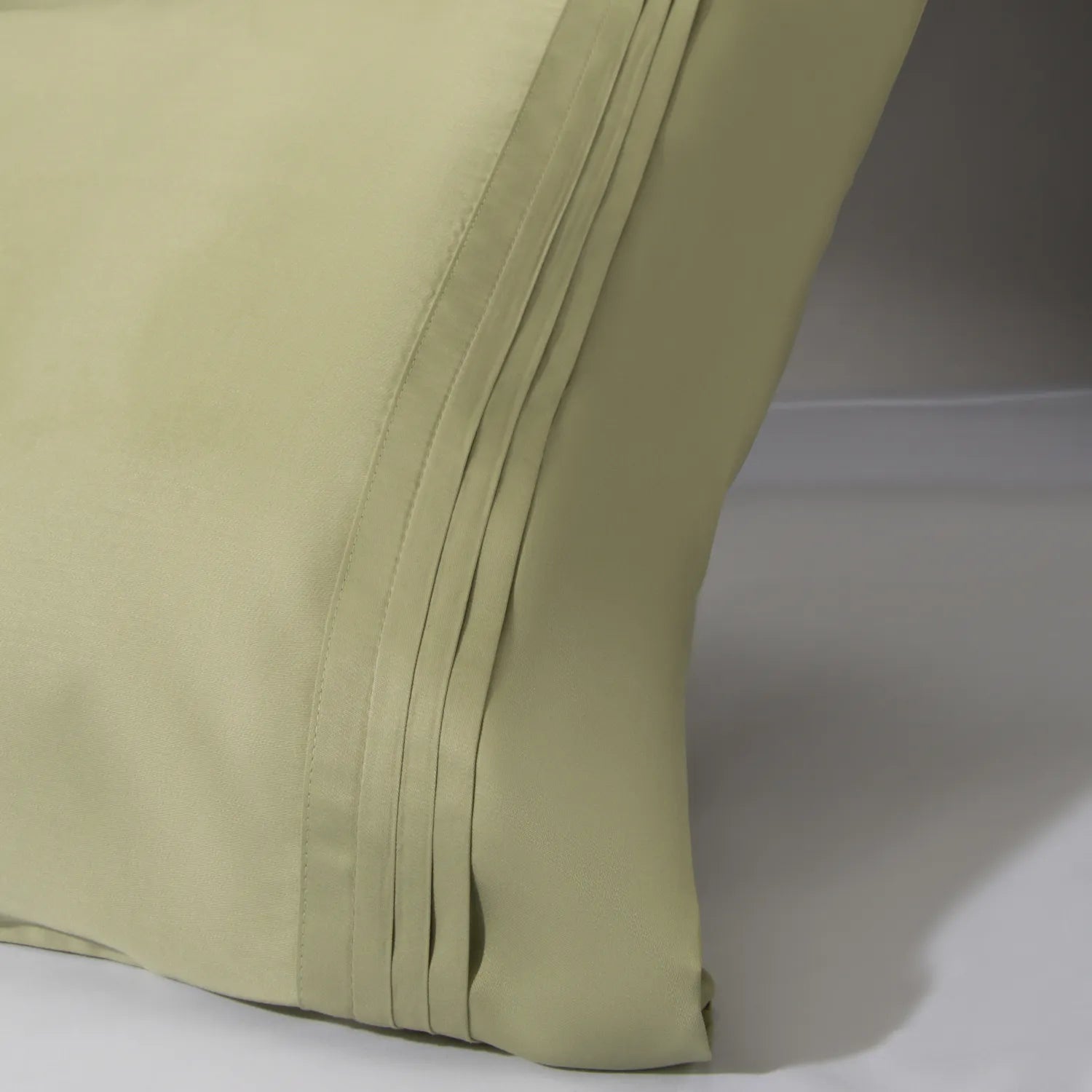 Capa de travesseiro na cor verde