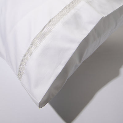 Image of the Blessing Sateen pillowcase from Voucler, ideal for comfortable bedrooms.